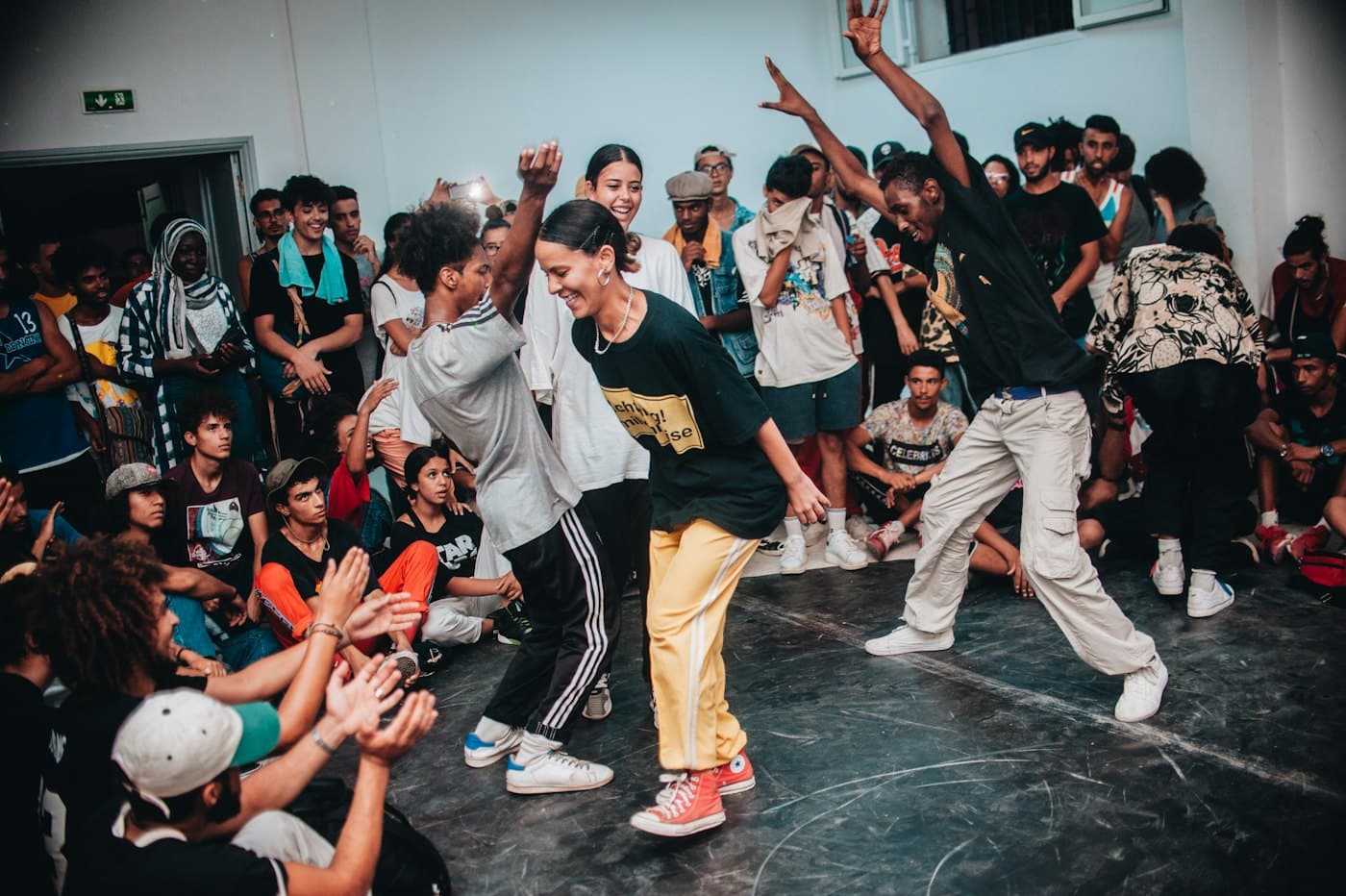 Dancers and a crowd at a street dance jam